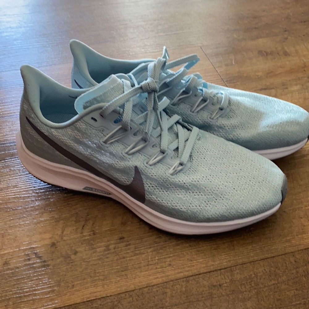 Nike women’s running shoes. Size 8. Never worn.